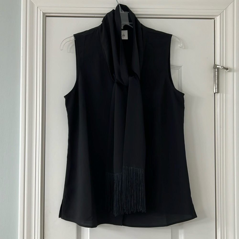 CAbi black sleeveless top with attached fringed scarf